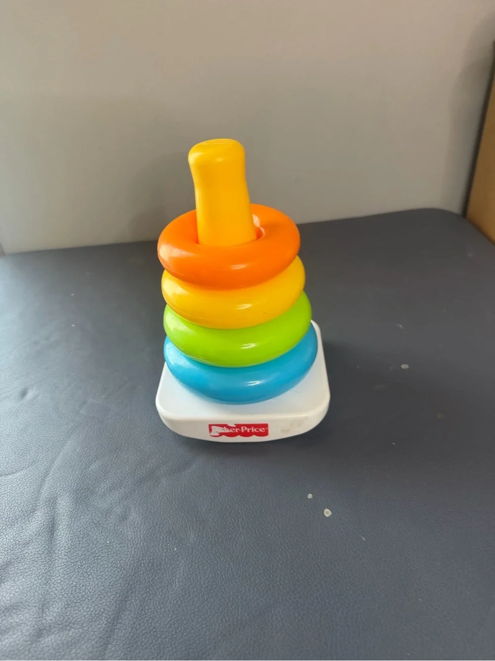 Fisher-Price Colorful Stacking Rings Toy has some flaws and missing parts